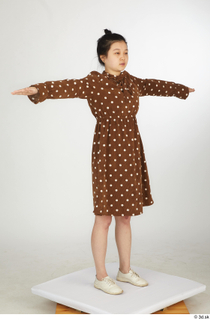 Aera brown dots dress casual dressed standing t poses white…